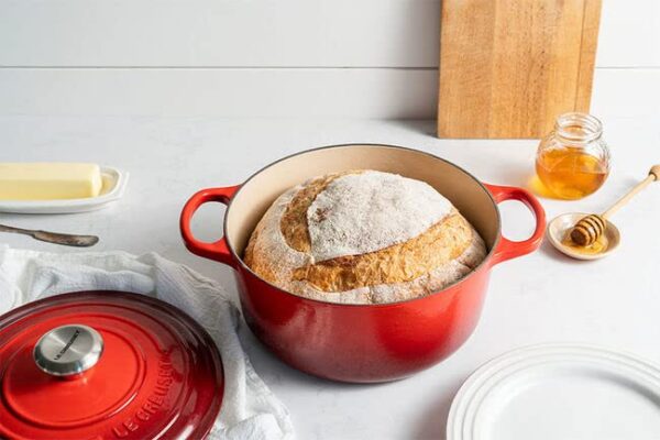 Le Creuset Enameled Cast Iron Signature Round Dutch Oven, 5.5 qt., Cerise - Image 3